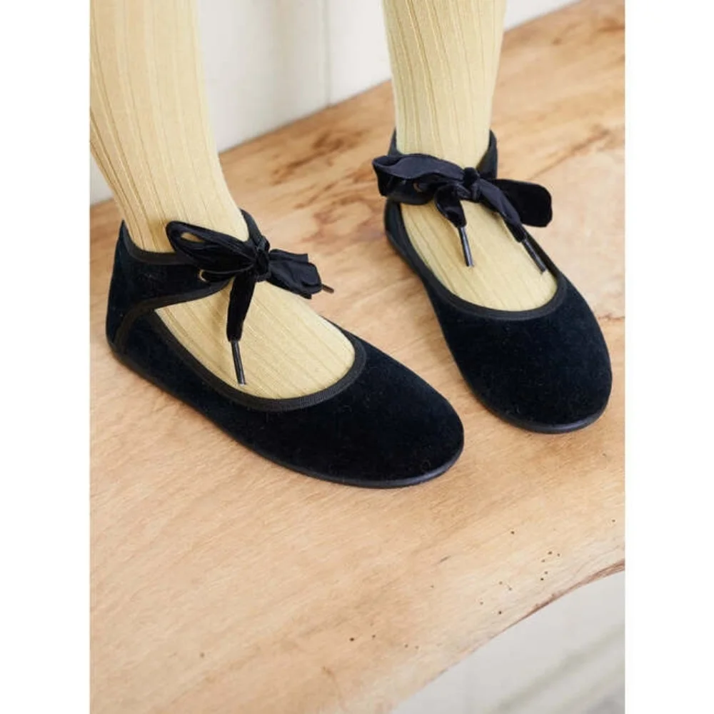 La Coqueta's stunning Black Bow Ballerina shoes.